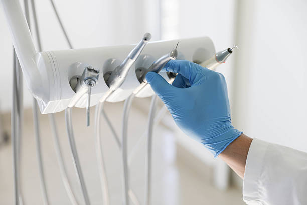 Professional Emergency Dentist technician working in Bethpage, NY